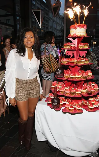 Cake, Cake, Cake! - Taraji P. Henson poses next to tiers and tiers of cupakes at the Courvoisier Rose One Year Anniversary Event at Toy in New York City.   (Photo: Jerritt Clark/WireImage)