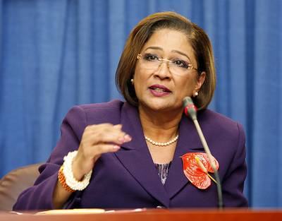 Trinidad?s Prime Minister Dodges Death Plot - The prime minister of Trinidad and Tobago, Kamla Persad-Bissessar, announced that the country's law enforcement officials thwarted a plot to assassinate her and other government officials.(Photo: REUTERS/Andrea De Silva)