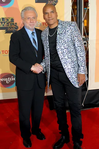 Wolf Blitzer and Paxton Baker - Sequins&nbsp;aren't just for women! The Centric TV executive rocked a sequined blazer while the CNN host kept it business as usual. (Photo: Kat Goduco/PictureGroup)