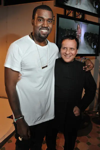 Kanye West and Azzedine Alaia - Kanye has attended Azzedine Alaïa’s runway shows in the past and the designer returned the favor popping up at the rapper’s show and even inviting him to dinner at his house the next night. (Photo by Pascal Le Segretain/Getty Images)