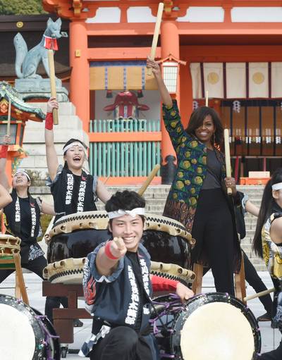 Dateline: Kyoto, March 20, 2015 - Obama plays the Taiko (Japanese traditional drum) with Manaka Hirose and members of the Akutagawa high school Taiko Club at the Fushimi Inari shrine in Kyoto   (Photo: TOSHIFUMI KITAMURA/AFP/Getty Images)