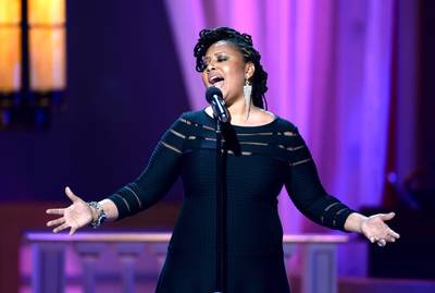 Get Behind the Groove - Of course Lalah caught the music bug early, starting to write songs while in high school. &nbsp;In 1989, she signed to Virgin Records and released her first song &quot;Inside the Beat.&quot;(Photo: Jason Kempin/Getty Images for BET)