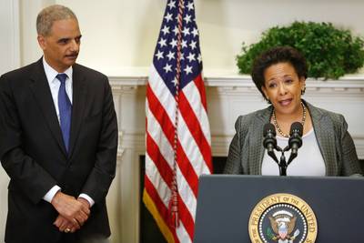 Why the Wait? - More than five months after her nomination, Loretta Lynch is still waiting for a confirmation vote from the Senate. &quot;You would actually think that her process would be sped up given their desire to see me out of office,&quot; says Holder. &quot;Be that as it may, logic has never been necessarily a guide up there.&quot;  (Photo: REUTERS/JONATHAN ERNST/LANDOV)