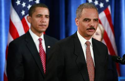 A Historic Pick - History was made in December 2008 when Obama formally nominated Holder to serve as the nation's first African-American attorney general. The president-elect said in his remarks that Holder had &quot;the talent and commitment to succeed … from his first day on the job, which is even more important in a transition that demands vigilance.&quot; In addition, he added, Holder also had &quot;the combination of toughness and independence that we need at the Justice Department.&quot;(Photo: Scott Olson/Getty Images)