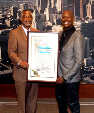 PAUSE FOR THE CAUSE - Singer/actor Tyrese Gibson and California State Assembly Member Curren Price kicked off day one of the 2015 BET Experience by attending the City Council Resolution for Tyrese event at L.A’s City Hall.&nbsp;(Photo: Maury Phillips/BET/Getty Images for BET)