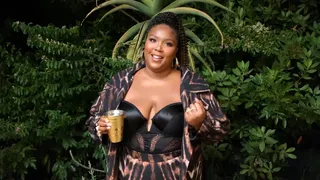 Lizzo proved she's 100% that chick with a high curly ponytail. - (Photo: BET) (Photo: BET)
