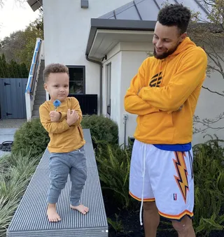 Steph Curry - Steph Curry left fans&nbsp;swooning over this adorable photo with his 2-year-old son, Canon. The proud dad posed with his little guy after Canon received his first haircut. Mama Ayesha took the photo of the duo with her caption reading, "Baby boy got his first haircut and I can’t deal 😭. My handsomes!!!!" How precious! (Photo: Ayesha Curry) Photo: Ayesha Curry