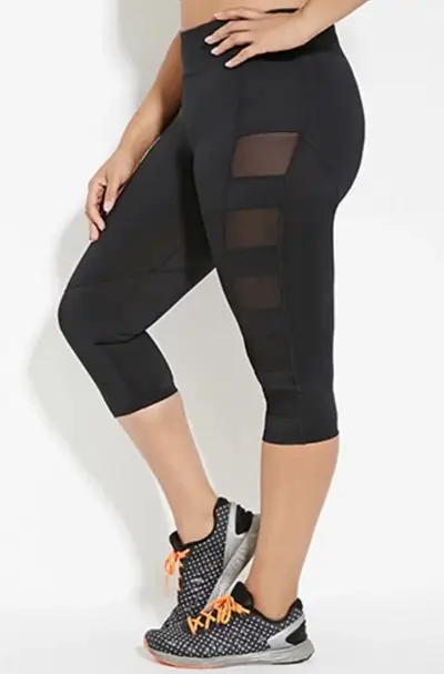 Mesh-Paneled Capri Leggings - These lycra and sheer mesh leggings are the epitome of sexy and sleek. Oh, and there’s a hidden pocket in there, too!&nbsp;(Photo: Forever 21)