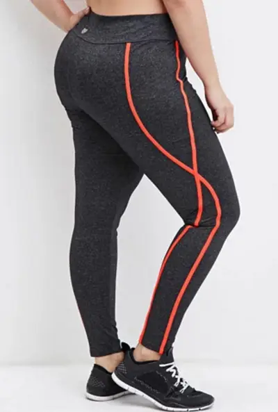 Trim Heathered Athletic Leggings - No one wants a boring Black legging, and with this gray-and-salmon striped pant, you don’t have to have one. Plus, it's built to hug and love all of your curves and hide your keys. Come through hidden pocket!(Photo: Forever 21)