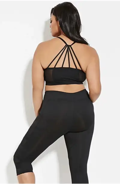 Webbed-Back Sports Bra - A perfect match to the stretch and sheer leggings, this webbed sports bra gives you all the feels for all of your low-impact activities like that ballet barre class or favorite POUND Fitness.(Photo: Forever 21)