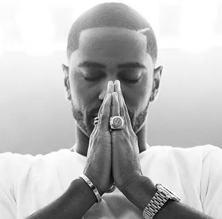 Big Sean, @bigsean - Pinky ring game has been strong since day one when it comes to Big Sean... even in prayer.&nbsp;   (Photo: Big Sean via Instagram)
