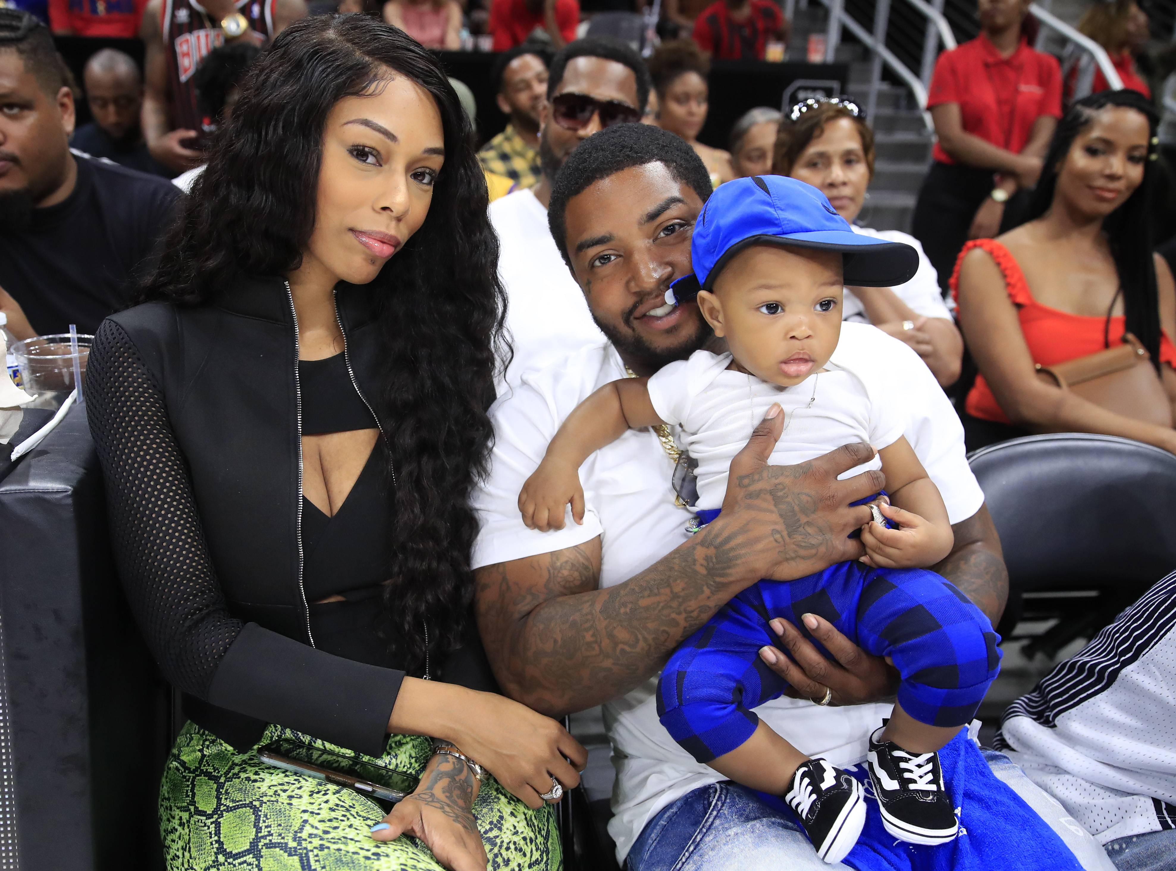 ATLANTA, GEORGIA - JULY 07: Bambi, Lil Scrappy and their baby Breland attend the game between Power and Trilogy during week three of the BIG3 three on three basketball league at State Farm Arena on July 07, 2019 in Atlanta, Georgia. (Photo by Andy Lyons/BIG3/Getty Images)