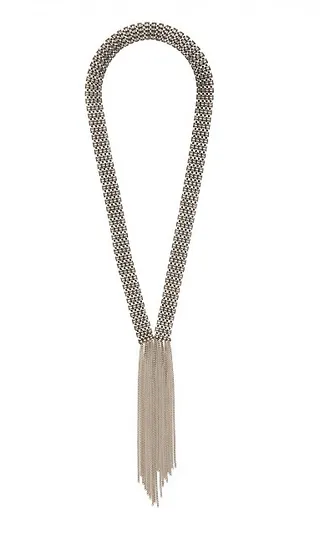 Calypso St. Barth Sari Necklace - Jewelry designer Ellen Arthur captures the line between hard and soft materials with this antique gold brass link necklace flaunting a delicate 13” fringe tassel.  (Photo: Courtesy Calypso)