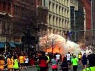 The Bombings - On April 15, 2013, at about 3 p.m. EDT, an explosive device goes off near the finish line of the Boston Marathon. A second blast follows about 12 seconds later.&nbsp;(Photo: AP Photo/WBZTV)