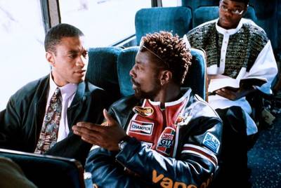 Kyle and Randall, Get on the Bus - In Get on the Bus, Spike Lee's movie about a bus trip to the Million Man March, Isaiah Washington and Harry J. Lennix played gay couple Kyle and Randall. One of the film's most powerful moments is when Kyle beats up a homophobic felloe passenger over his comments. (Photo: Columbia Pictures)