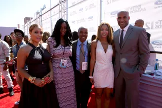 The Big Day - Tamia took a moment to snap a shot with Boris Kodjoe and several other guests on the red carpet.   (Photo: BET)