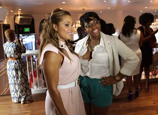 All Smiles - Tamia takes a moment to smile at the camera with her interviewer.     (Photo: BET)