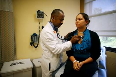 /content/dam/betcom/images/2012/07/Health/070212-health-obamacare-and-how-it-affects-blacks.jpg