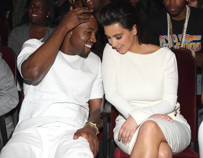 New Love - Kanye and Kim share an intimate moment during the show. (Photo: Getty Images for BET)