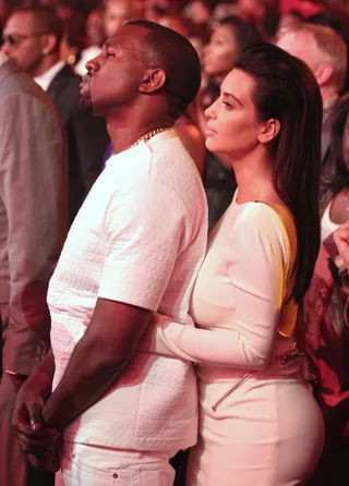 Kimye - Before baby Kimye was even thought about, Kanye and Kim shared this precious moment at the 2012 BET Awards in their all-white outfits.&nbsp;(Photo: Christopher Polk/Getty Images for BET)