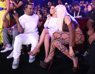 Monsters - Nicki Minaj and Kanye share a candid moment in the front row.(Photo: Christopher Polk/Getty Images for BET)