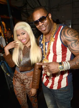 Time to Mingle - Nicki Minaj and Busta Rhymes get cute backstage.  (Photo:&nbsp; Jason Merritt/Getty Images For BET)