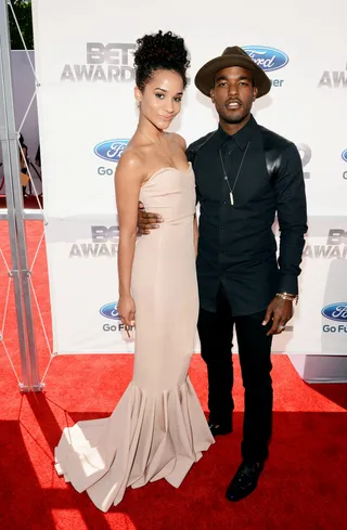 Luke James and Guest - Luke James stepped up to the occasion in dapper style, rocking a black look, complete with a brown cowboy hat.(Photo: Mark Davis/Getty Images for BET)