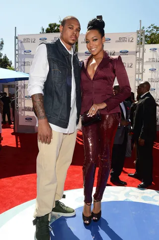 Monica and Shannon Brown - Monica was all sweetness, while her beau chose a street vibe with a denim vest worn over a white top and light denim jeans.  (Photo: Mark Davis/Getty Images for BET)