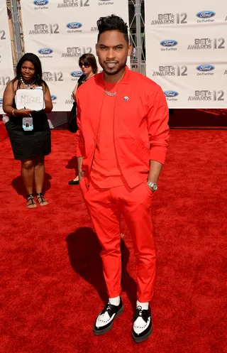 Miguel - We're gushing over Miguel's black and white flatforms! The Quickie singer's burnt orange getup (by Cadet) and slick pompadour are pretty cool too.(Photo: Jason Merritt/Getty Images For BET)