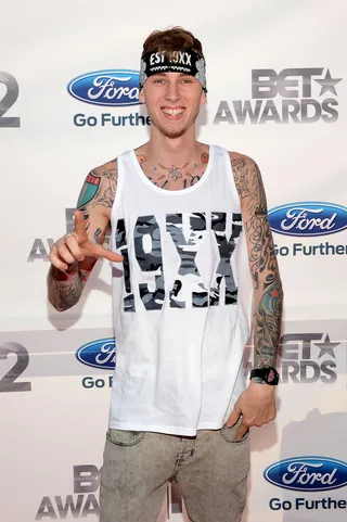 Machine Gun Kelly - Machine Gun Kelly, representing Bad Boy, shows off his many tattoos in a relaxed tank.  (Photo: Mark Davis/Getty Images for BET)