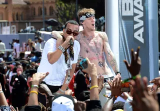 Shot Callers - French Montana is joined by his labelmate MGK during a performance of his hit song "Shot Caller" onstage at the 2012 BET Awards Pre-Show outside the Shrine Auditorium.(Photo: Earl Gibson III/Getty Images For BET)