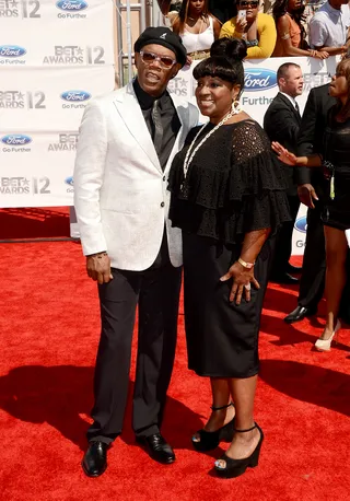 Samuel L. Jackson and Latanya Richardson - The 2012 BET Awards host, Samuel L. Jackson, opted for a white sports jacket and black pant combo--coupled with a Kangol turned to the back of course.&nbsp;Latanya Richardson chose a black dress finished with ruffles and white jewelry.  (Photo: Jason Merritt/Getty Images For BET)