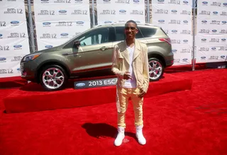 Jacob Latimore - In a Marc Jacobs jacket with complementing Balmain jeans, the singer/actor attends the BET party with swag.(Photo: Maury Phillips/Getty Images For BET)