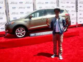 Astro - The X-Factor castoff proves he can roll with the big boys in a classic look: denim jacket, khaki pants and Chuck Taylors.(Photo: Maury Phillips/Getty Images For BET)