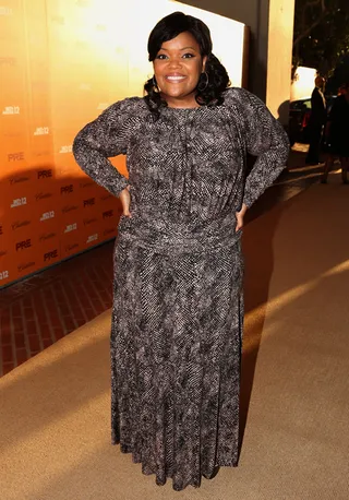 Yvette Nicole Brown - Consumate funny woman Yvette Nicole Brown swapped her signature casual look for a snake-print floor length gown.&nbsp;(Photo: Christopher Polk/Getty Images For BET)