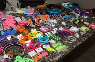 Rainbow Colored Earrings - Ear wear and necklaces for the ladies is usually a sea of hoops, baubles and beaded jewelry. These bright pink, purple, blue, green and orange colored items would make a pack of Skittles jealous.(Photo: Jason Merritt/Getty Images)