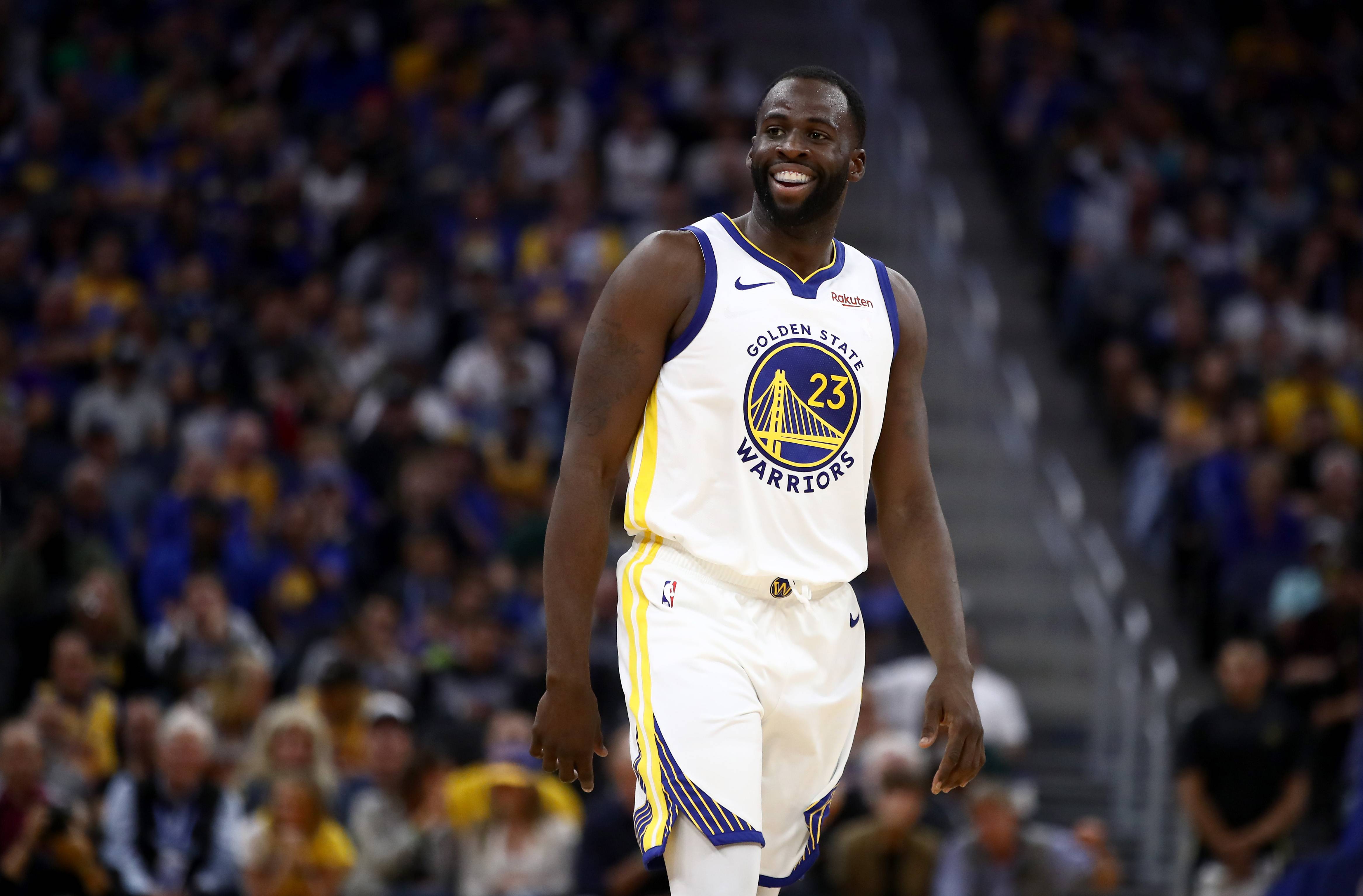 SAN FRANCISCO, CALIFORNIA - OCTOBER 05:  Draymond Green #23 of the Golden State Warriors smiles during their game against the Los Angeles Lakers at Chase Center on October 05, 2019 in San Francisco, California.  NOTE TO USER: User expressly acknowledges and agrees that, by downloading and or using this photograph, User is consenting to the terms and conditions of the Getty Images License Agreement.  (Photo by Ezra Shaw/Getty Images)