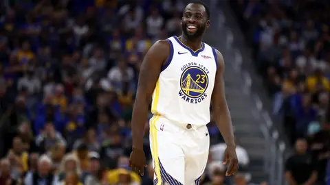 SAN FRANCISCO, CALIFORNIA - OCTOBER 05:  Draymond Green #23 of the Golden State Warriors smiles during their game against the Los Angeles Lakers at Chase Center on October 05, 2019 in San Francisco, California.  NOTE TO USER: User expressly acknowledges and agrees that, by downloading and or using this photograph, User is consenting to the terms and conditions of the Getty Images License Agreement.  (Photo by Ezra Shaw/Getty Images)