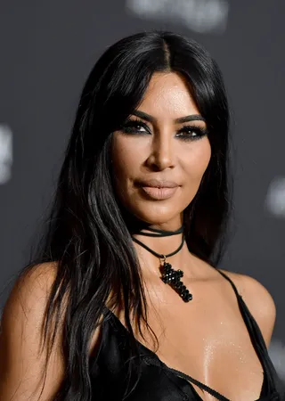 Kim Kardashian&nbsp; - Kim K is no stranger to the beauty tricks and trades and she just may have tightened up her neck and face area for a younger look.&nbsp; (Photo: David Livingston/Getty Images)