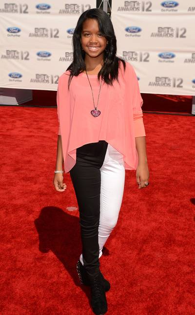 Making Her Screen Debut - Gabi Wilson made her acting debut at the age of 9 when she starred in the Nick Cannon-directed TV film School Gyrls. The young performer played the daughter of a school headmaster played by Angie Stone.&nbsp;  (Photo: Jason Merritt/Getty Images For BET)