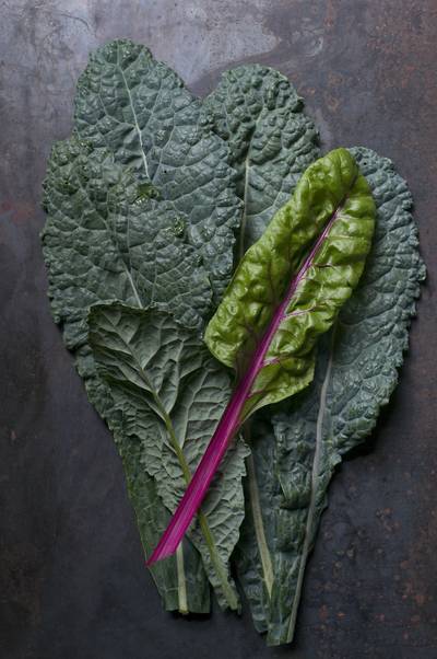 Swiss Chard - This green veggie is packed with dozens of antioxidants and vitamins such as magnesium and potassium. Swiss chard is good for regulating your blood sugar, improving bone health and reducing inflammation in your body. Eat it as a salad or sauté with garlic for an easy side dish to any meal.(Photo: Stacey Cramp/Aurora Photos/Corbis)