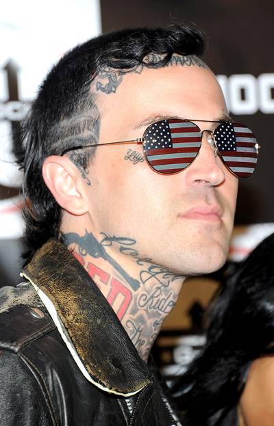 Yelawolf&nbsp; - Yelawolf&nbsp;has &quot;Slumerican&quot; tatted in huge letters across the top of his forehead. The Alabama MC's ink is a reference to his song &quot;Slumerican S**tizen,&quot; but he probably should have left it on wax.(Photo: Jamie McCarthy/Getty Images for G-Shock)