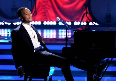 John Legend - Love is in the air; and if you're rich and famous, you may commemorate your unions with the ultimate wedding gift: having a favorite musician serenade your new spouse.&nbsp;Kim Kardashian and Kanye West tied the knot on Saturday (May 24), for example, and Yeezy enlisted his G.O.O.D. Music mate and long-time friend John Legend to sing to his bride and their more than 500 wedding guests at their wedding reception in Florence, Italy. Legend&nbsp;sang a few of his hits for the Wests, including &quot;All of Me,&quot; the song he wrote and sang for his own wife,&nbsp;Chrissy Teigen,&nbsp;at their 2013 wedding.&nbsp;(Photo: Kevin Winter/Getty Images)