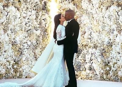 All in a Picture - Speaking of wedding pictures, all that work Kanye claims he put into perfecting their first wedding pic paid off — the sweet image was the most liked photo in Instagram history at the time.&nbsp;  (Photo: Kim Kardashian via Instagram)