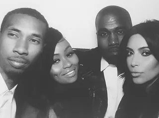 The Next Kimye? - The newlyweds-to-be strike a pose with Tyga and Blaq Chyna in a photo booth at the rehearsal dinner in the Palace of Versailles. Rumor has it that Tyga and his girl, who are Kim's neighbors in Calabasas, have landed their own reality show deal.&nbsp;  (Photo: blacchyna via Instagram)
