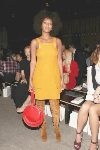 Solange - Solange paid tribute to the 9/11 first responders at the Zimmerman show Friday. Her mustard yellow dress was offset by thigh-high suede boots and a fire-engine red handbag.(Photo: Mireya Acierto/Getty Images for Zimmermann)