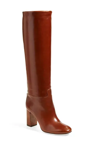 The Boot: Tory Burch Devon Boot ($695) - The '70s are back and tall boots are a must-buy this season. Fall in love with the rich caramel color of this Tory Burch pair.(Photo: Tory Burch)