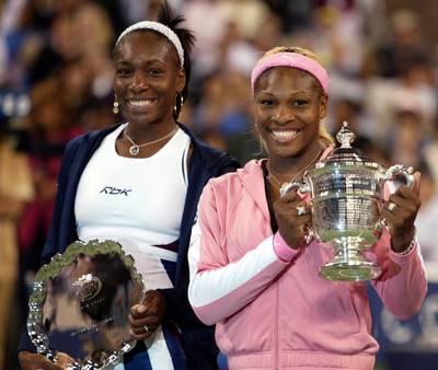 2002 U.S. Open FinalWinner: Serena Williams  - A year after losing to her older sister in the same tournament, Serena proudly showed off the 2002 U.S. Open trophy after beating Venus&nbsp;6-4, 6-3. Serena lost by nearly the same score in 2001. (Photo: REUTERS/ Shaun Best /Landov)