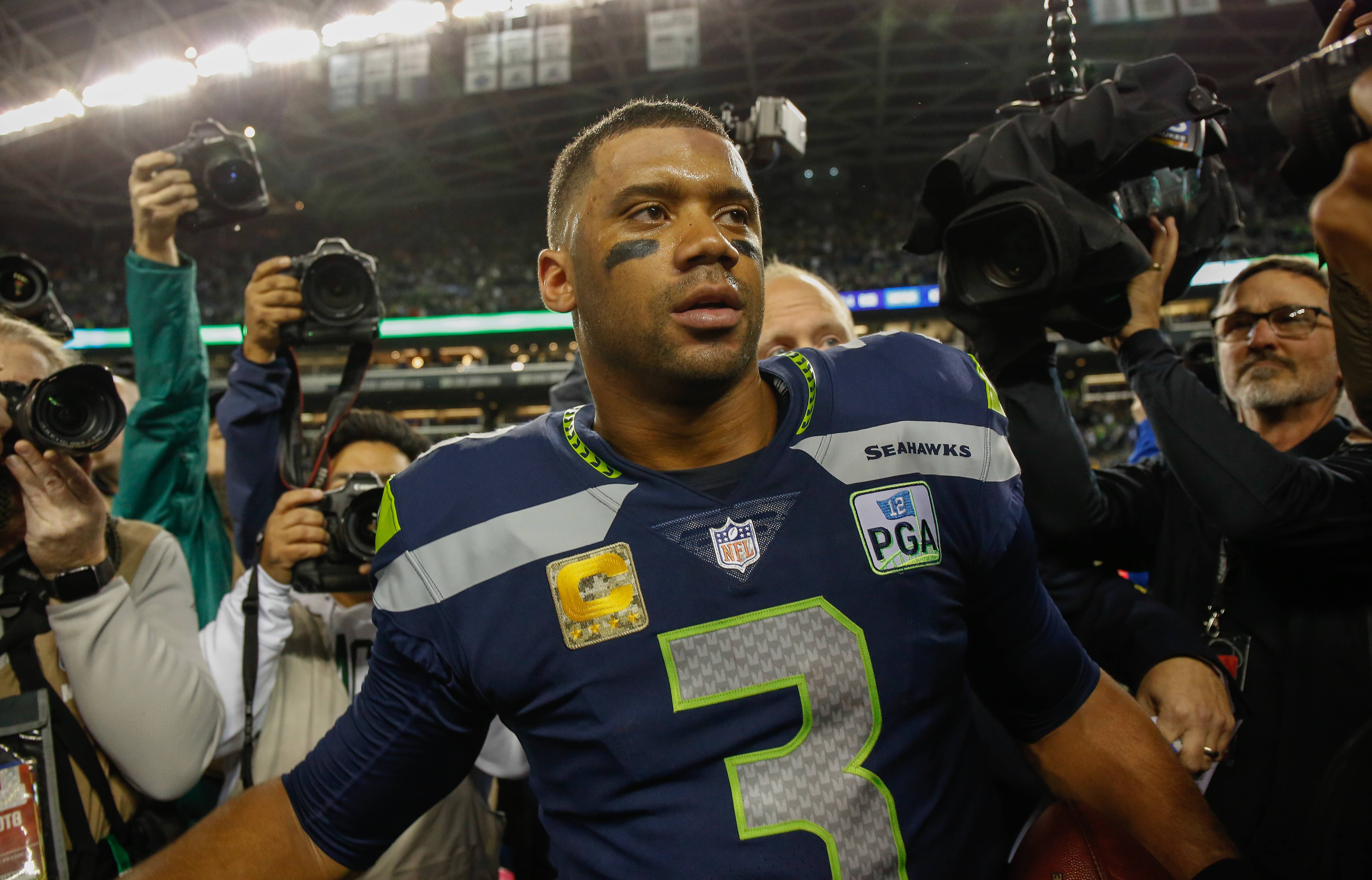 Seahawks QB Russell Wilson gifts his offensive linemen $12,000 in   stock