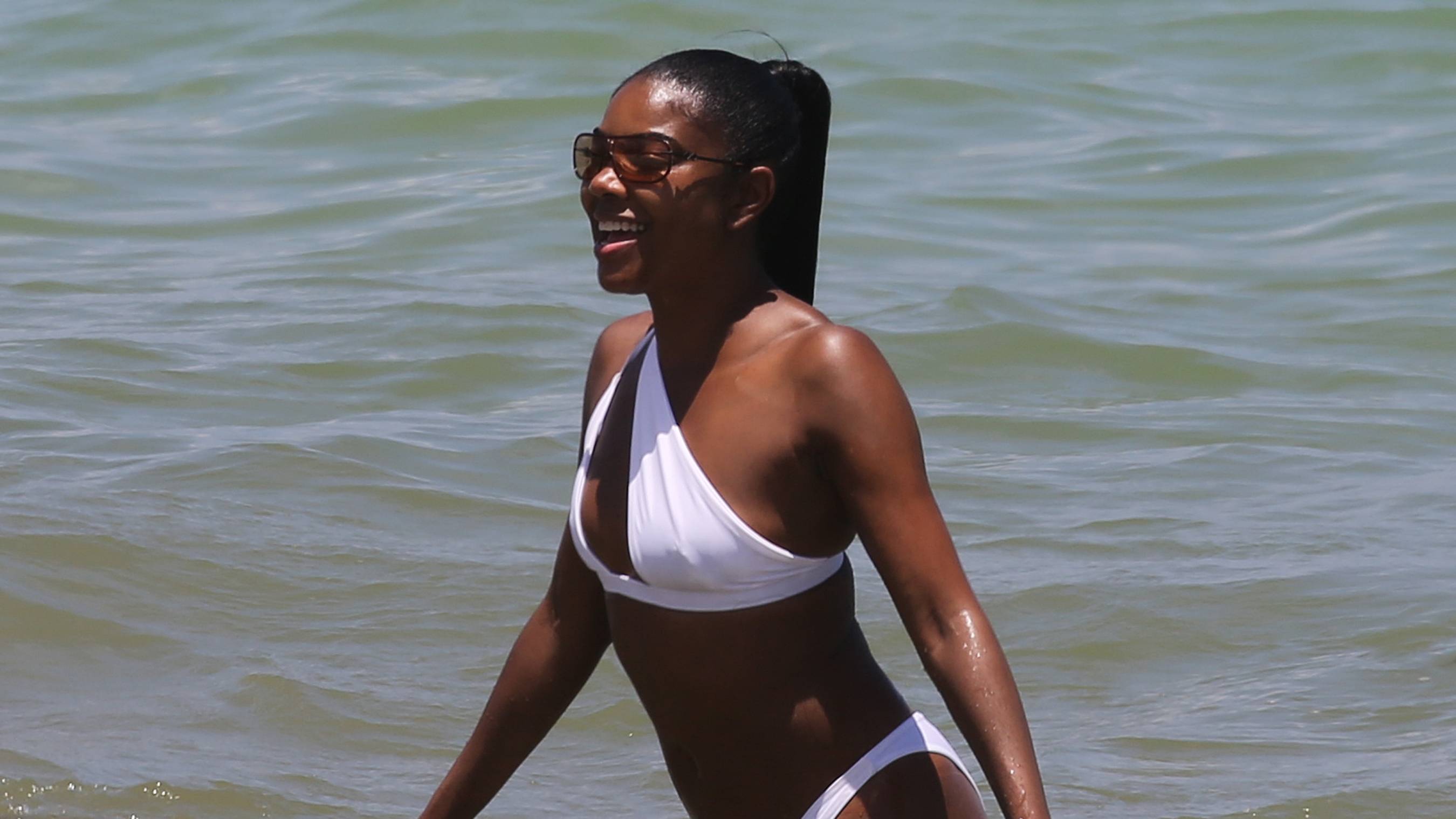 Gabrielle Union is seen on the beach on June 15, 2023 in MIami Beach, Florida. 